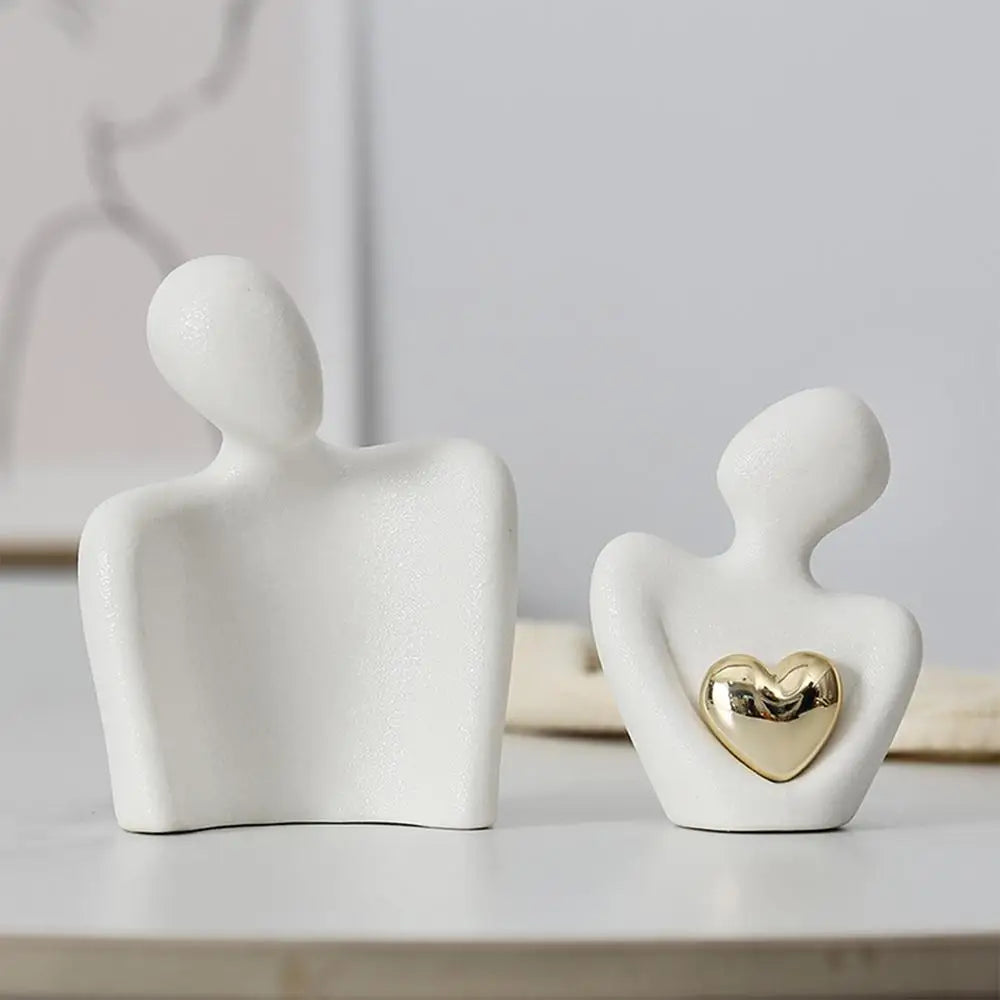 Harmony in Form: Abstract Couple Ceramic Sculpture